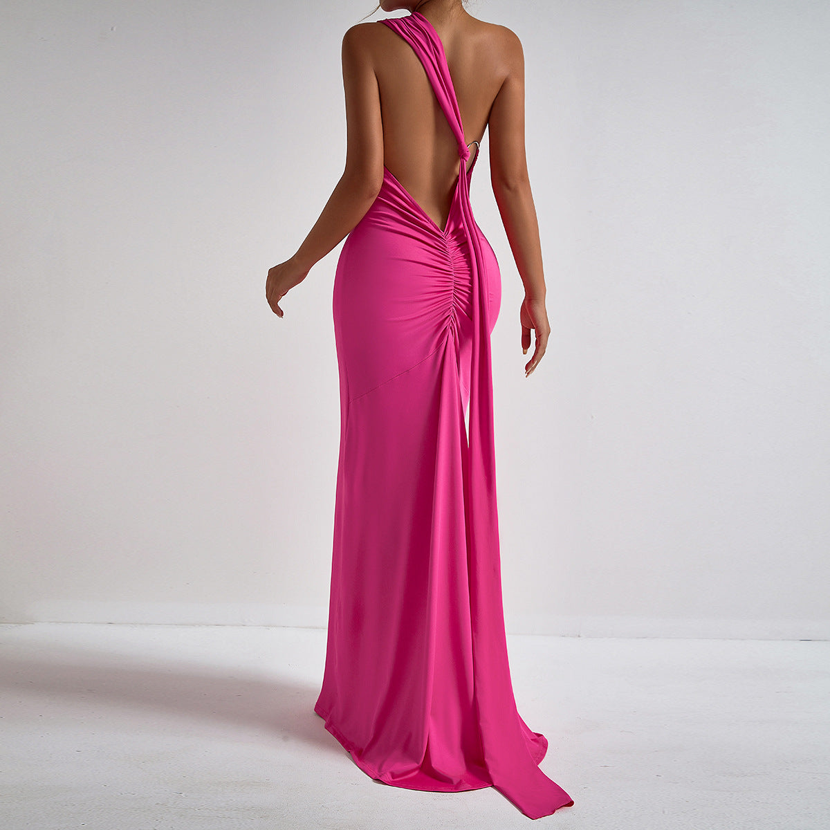 Hanging neck pleated slim fitting irregular floor length dress